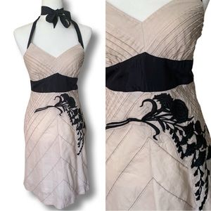 Anthropologie Floreat halter-tie dress-Tan with black floral embroidery.